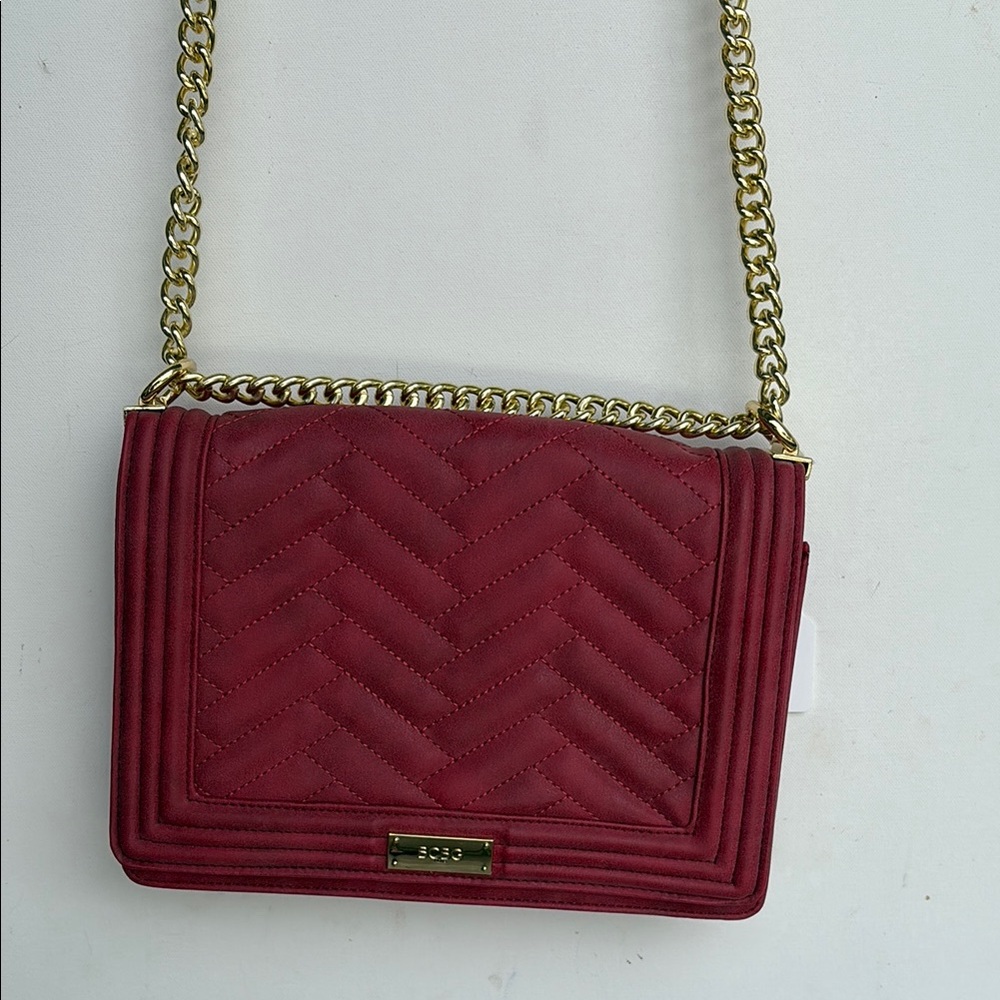 Chic Red and Gold Crossbody Bag with Quilted Design